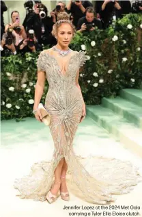  ?? ?? Jennifer Lopez at the 2024 Met Gala carrying a Tyler Ellis Eloise clutch.