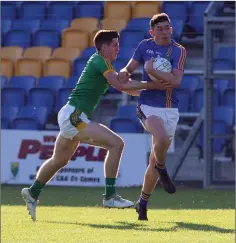  ??  ?? Wicklow’s Padraig O’Toole on the burst through the middle.