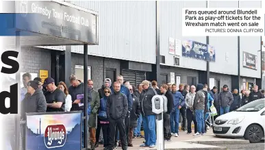  ?? PICTURES: DONNA CLIFFORD ?? Fans queued around Blundell Park as play-off tickets for the
News Wrexham match went on sale