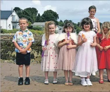  ??  ?? Bay Queen Rosie McNamara and last year’s Queen Annie West join their attendants after the ceremony.