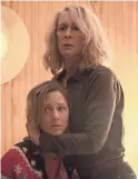  ?? RYAN GREEN/UNIVERSAL ?? Laurie Strode (Curtis) is protective of daughter Karen (Judy Greer) in “Halloween.”