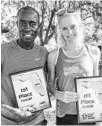  ?? AILEEN PERILLA/CORRESPOND­ENT ?? Evans Kirwa, 28, of Colorado Springs, Colo., and Sara Trane 32, of Stockholm, Sweden, finished first in their respective divisions.