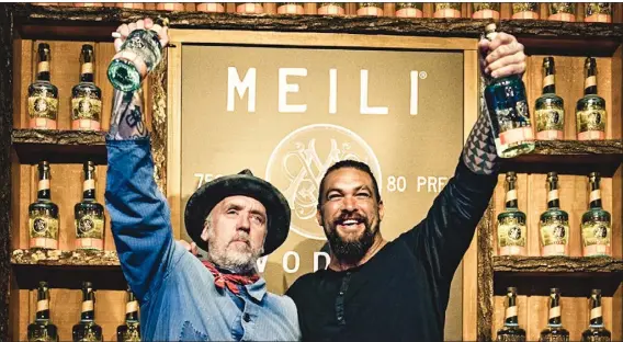  ?? PHOTO COURTESY OF EXPEDITION STUDIOS ?? Actor Jason Momoa and celebrity entreprene­ur Blaine Halvorson, left, will meet and greet fans and autograph bottles of their Meili Vodka at Denver-area liquor stores on Oct. 25and 26.