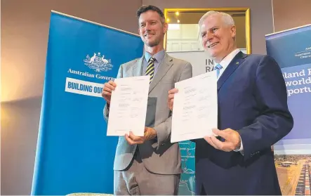  ?? Picture: Tobi Loftus ?? DEAL DONE: Qld Transport Minister Mark Bailey (left) and Deputy Prime Minister Michael McCormack.