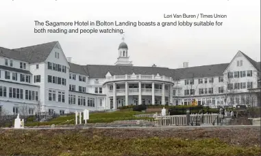  ?? Lori Van Buren / Times Union ?? The Sagamore Hotel in Bolton Landing boasts a grand lobby suitable for both reading and people watching.