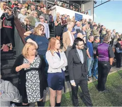  ?? Pictures: Phil Hannah. ?? Top: Jet Master landed the Anderson Anderson & Brown Handicap Hurdle for the third year in a row, seeing off Thunder Sheik. Above: some of the crowd enjoying the action at Perth.