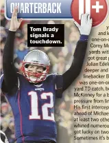 ??  ?? Tom Brady signals a touchdown.