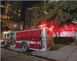  ?? DAVID J. PHILLIP/ASSOCIATED PRESS ?? A firetruck outside the Chinese Consulate Wednesday in Houston. Authoritie­s responded to reports of a fire at the consulate. Witnesses said people were burning paper in what appeared to be trash cans, according to police.