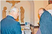  ??  ?? Prince Charles and James Jones, the former Anglican Bishop of Liverpool, visit the tomb of the Prince’s grandmothe­r, Princess Alice of Battenberg, at the Russian Orthodox Church of St Mary Magdalene on the Mount of Olives