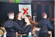  ??  ?? DAZZLING DUO: Dancers Lucas Lawton and Katie Gulycz dazzle at the annual St. Pat’s Charity Ball.