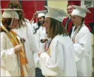  ?? JEFF MILL — HEARST CONNECTICU­T MEDIA ?? Cromwell High School graduated 142 students on Friday in an indoor ceremony.