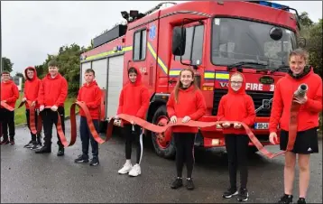  ??  ?? Ready for Action…..Rampark NS 6th Class pupils who took part in the Virtual Firwwalk in aid of local fire services and supporting crews. Included are Shane McCusker, Pearse Mulroy, Adam Woolard, Aaron Phillips, Leah Dunne, Emily Duffy, Aoife McKeever and Maggie Holland. Pictu