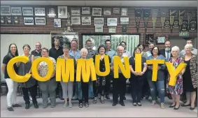  ??  ?? The ‘Community’ letters, lead by chair Brad Drust with past and present directors.