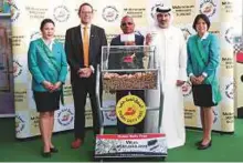  ?? Courtesy: DDF ?? Ramesh Cidambi, DDF’s chief operating officer; Salah Tahlak, executive vice-president-corporate services, and Nic Bruwer, executive vice-president-commercial at the draw held at the venue of the Dubai Airshow.