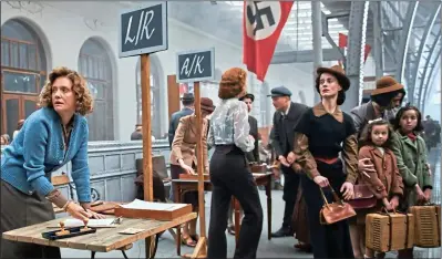  ?? ?? LESSON: In a scene from One Life, Jewish children board trains to flee the Nazis. Most never saw their parents again