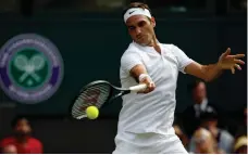  ?? AP PHOTO/ALASTAIR GRANT ?? NO EFFORT NEEDED: Roger Federer’s opponent Alexandr Dolgopolov withdrew injured.