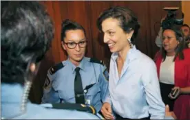  ?? MICHEL EULER — THE ASSOCIATED PRESS ?? UNESCO’S new elected director-general France’s Audrey Azoulay smiles as she arrives the council hall at the UNESCO headquarte­rs in Paris, France, Friday. UNESCO’s executive board has chosen France’s Audrey Azoulay as the Paris-based U.N. agency’s new...