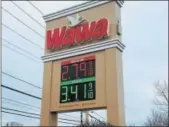  ?? DONNA ROVINS — DIGITAL FIRST MEDIA ?? Thursday’s gasoline price is displayed at the Wawa on West Schuylkill Road in North Coventry. AAA is forecastin­g gas prices topping $3 per gallon for this summer.