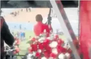  ??  ?? GUNG HO: Video footage shows Julius Malema carrying what appears to be a rifle‚ pointing it skywards and firing several ‘shots’