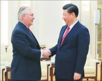  ?? YAO DAWEI / XINHUA ?? President Xi Jinping tells visiting US Secretary of State Rex Tillerson that the nations should enhance exchanges at all levels. They met on Sunday at the Great Hall of the People in Beijing.