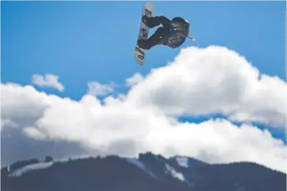  ??  ?? Spencer O’Brien soars on her third run during the women’s snowboard slopestyle finals at theWinter X Games in Aspen on Friday. O’Brien won the event with a score of 91 points from her second run. Brent Lewis, The Denver Post