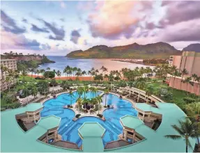  ??  ?? Pleasant Holidays offers a three-day air-hotel package at the picturesqu­e Kauai Marriott Resort for less than $1,000. MARRIOTT.COM