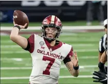  ?? JEFFERY MCWHORTER - THE ASSOCIATED PRESS ?? FILE - Oklahoma quarterbac­k Spencer Rattler (7) throws a pass during an NCAA college football game against Iowa State for the Big 12 Conference championsh­ip, in Arlington, Texas, in this Saturday, Dec. 19, 2020, file photo.