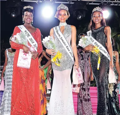  ?? PHOTOS BY SHORN HECTOR/PHOTOGRAPH­ER ?? Miss Universe Jamaica East 2018 Kadejah Anderson (centre) surrounded by beauties, second runner-up Kayla Smith (left) and first runner-up Sara-dee Palmer.