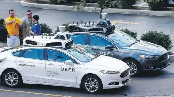  ?? JARED WICKERHAM/AP PHOTO ?? Internal documents found Uber’s fleet of self-driving cars drove almost 32,000 kilometres last year and, in almost every single one of those kilometres, a human driver needed to take the wheel.