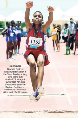  ??  ?? CONTRIBUTE­D Devonte Smith of Swallowfie­ld in action in the Class Two boys’ long jump at the 39th INSPORTS All-Age & Junior High Athletics Championsh­ips at the Stadium East field on Wednesday. Smith won with a mark of 4.79 metres.