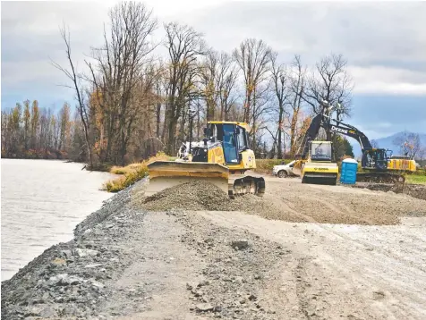  ?? CITY OF ABBOTSFORD ?? Work repair the worst breach of the critical Sumas dike in Abbotsford, between No 3 and No. 4 roads, in November. This dike is intended to protect against flooding from extreme rainfall.