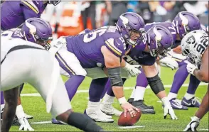  ?? [THE ASSOCIATED PRESS] ?? Vikings center Garrett Bradbury gets set to snap the ball during the Sept. 22 game against the Raiders in Minneapoli­s.