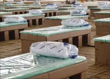  ??  ?? AFP India is deploying thousands of beds made of cardboard to makeshift medical facilities as it struggles to deal with the surging number of coronaviru­s cases