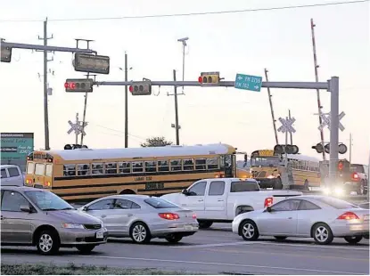  ?? Suzanne Rehak / For the Chronicle ?? A proposed expansion of Crabb River Road, also known as FM 762/FM 2759, is being considered that would relieve some traffic congestion. This is the intersecti­on of FM 762 and FM 2759 at 7:15 a.m. Oct. 15.