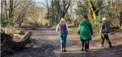  ??  ?? ●●Walkers enjoying a stroll at Heaton Mersey Common