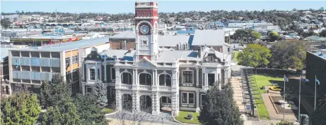  ??  ?? UNRIVALED: Toowoomba City Hall as viewed from the Burke and Wills Hotel. Photos Nev Madsen/Vic Bushing/Bev Lacey