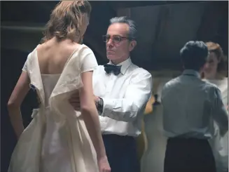  ?? Associated Press photos ?? In this image released by Focus Features, Vicky Krieps, left, and Daniel Day-Lewis appear in a scene from “Phantom Thread.”