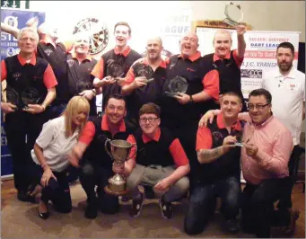  ?? Pics: John McKeown ?? Greyhound celebrate victory in the Premier final with League committee members.