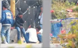  ??  ?? Migrants at Calais