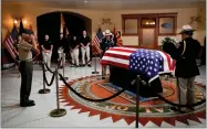  ?? AP PHOTO BY JAE C. HONG ?? Former U.S. Marine Jose Cordero Torres, 82, a Vietnam War veteran salutes near the casket during a memorial service for Sen. John Mccain, R-ariz. at the Arizona Capitol, Aug. 29, in Phoenix.