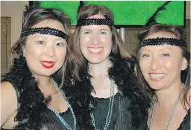  ??  ?? Sometimes it’s not about your game, but more about how you look. Hitting the links in their Roaring ’20s party dresses were Tammy Nguyen, Alex Bretsen and Andria Lee. Missing was Nikki Reuter.
