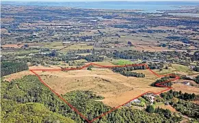  ??  ?? The 29.78-hectare elevated landholdin­g has existing resource consent for 27 lots of up to 10,000sqm (1ha).