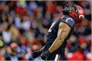  ?? AARON DOSTER / AP ?? Bearcats defensive lineman Curtis Brooks yells after sacking SMU QB Tanner Mordecai on Saturday in Cincinnati. UC held Mordecai to 63 yards passing.