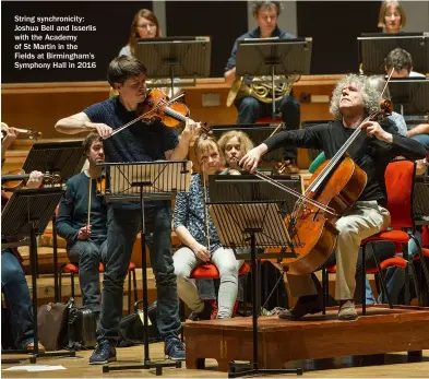  ??  ?? String synchronic­ity: Joshua Bell and Isserlis with the Academy of St Martin in the Fields at Birmingham’s Symphony Hall in 2016