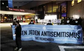  ?? Ofarim. Photograph: Dirk Knofe/AP ?? A protest outside the Westin hotel in Leipzig last week in solidarity with the musician Gil