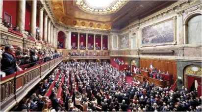  ?? EMMANUEL DUNAND/AGENCE FRANCE-PRESSE ?? LAWMAKERS applaud during the congress of both houses of parliament of France in Versailles, to anchor the right to abortion in the country’s constituti­on.