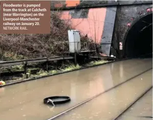  ?? NETWORK RAIL. ?? Floodwater is pumped from the track at Culcheth (near Warrington) on the Liverpool-Manchester railway on January 20.