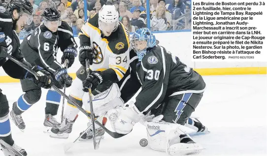  ??  ?? Les Bruins de Boston ont perdu 3 à 2 en fusillade, hier, contre le Lightning de Tampa Bay. Rappelé de la Ligue américaine par le Lightning, Jonathan AudyMarche­ssault a inscrit son premier but en carrière dans la LNH. Le joueur originaire de Cap-rouge a...