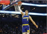  ?? SHAE HAMMOND — BAY AREA NEWS GROUP ?? Golden State Warriors' Patrick Baldwin Jr. (7) dunks the ball against the Utah Jazz in the fourth quarter at Chase Center in San Francisco on Dec. 28, 2022.