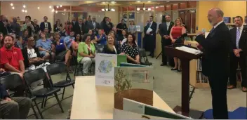  ?? KEVIN TUSTIN - MEDIANEWS GROUP ?? Gov. Tom Wolf speaks before a room full of educators and school leaders at the library of Coebourn Elementary School.